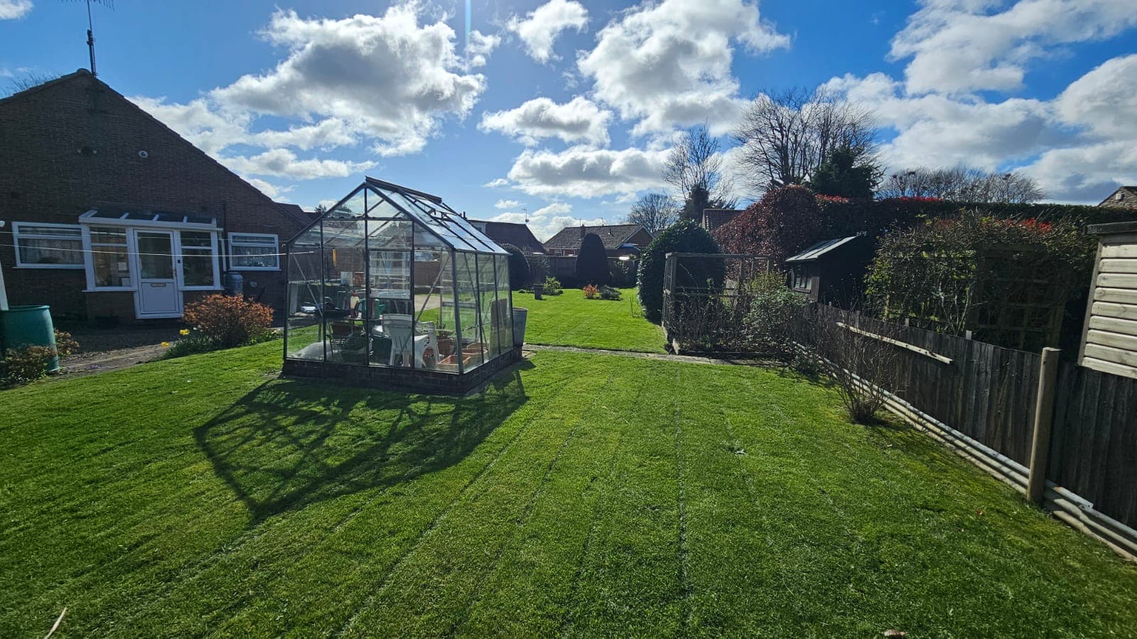 Grass cutting — Regular mowing, edging and seasonal feed.